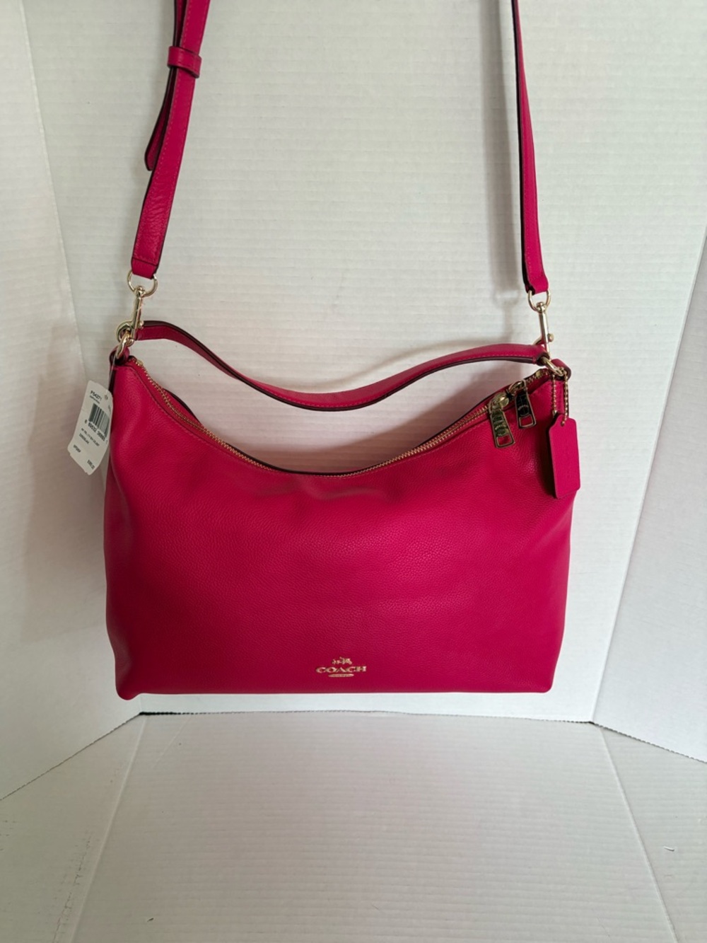 COACH Celeste East/West Convertible Hobo in pink ruby